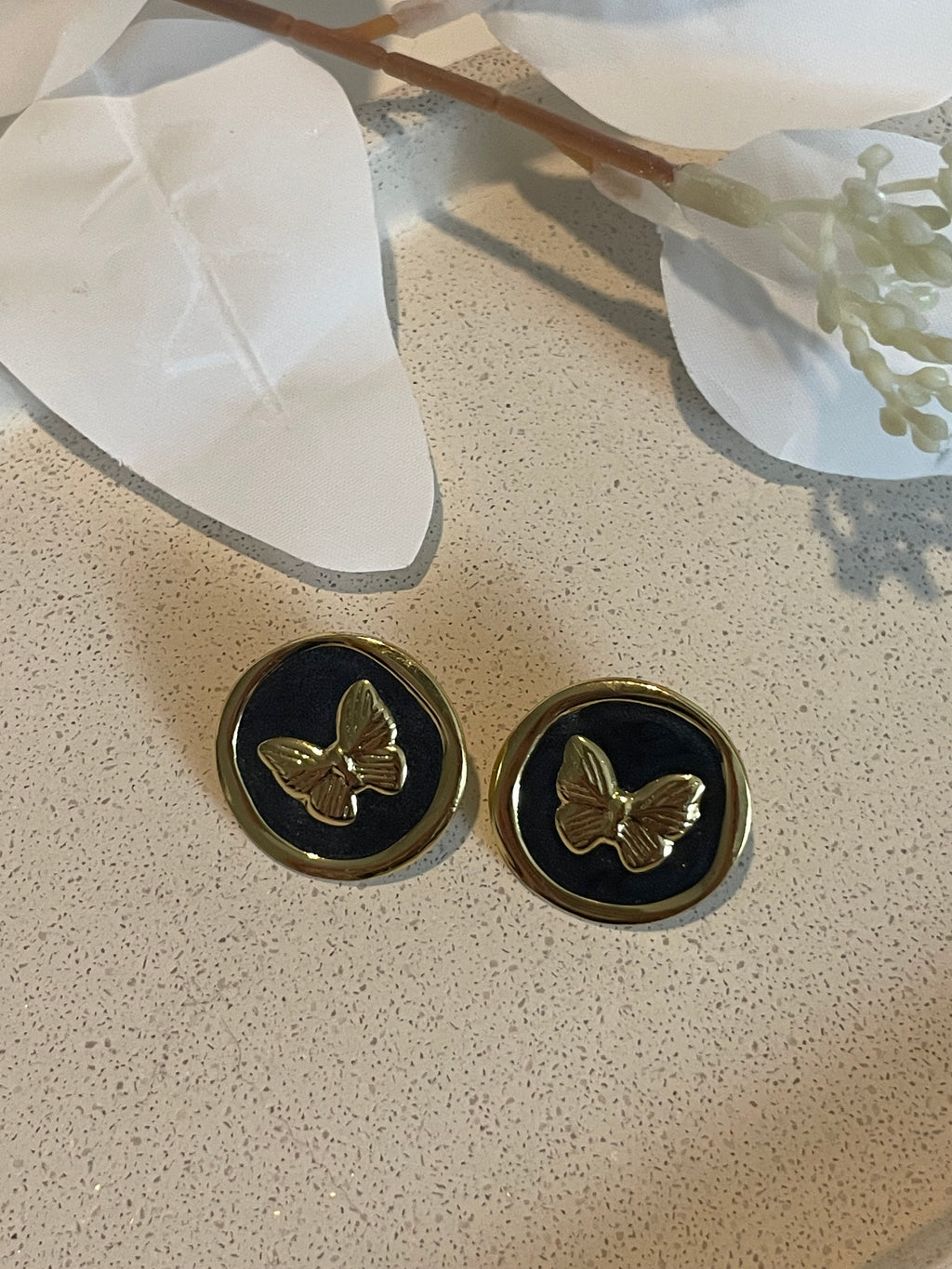 Boucle d’oreille papillon