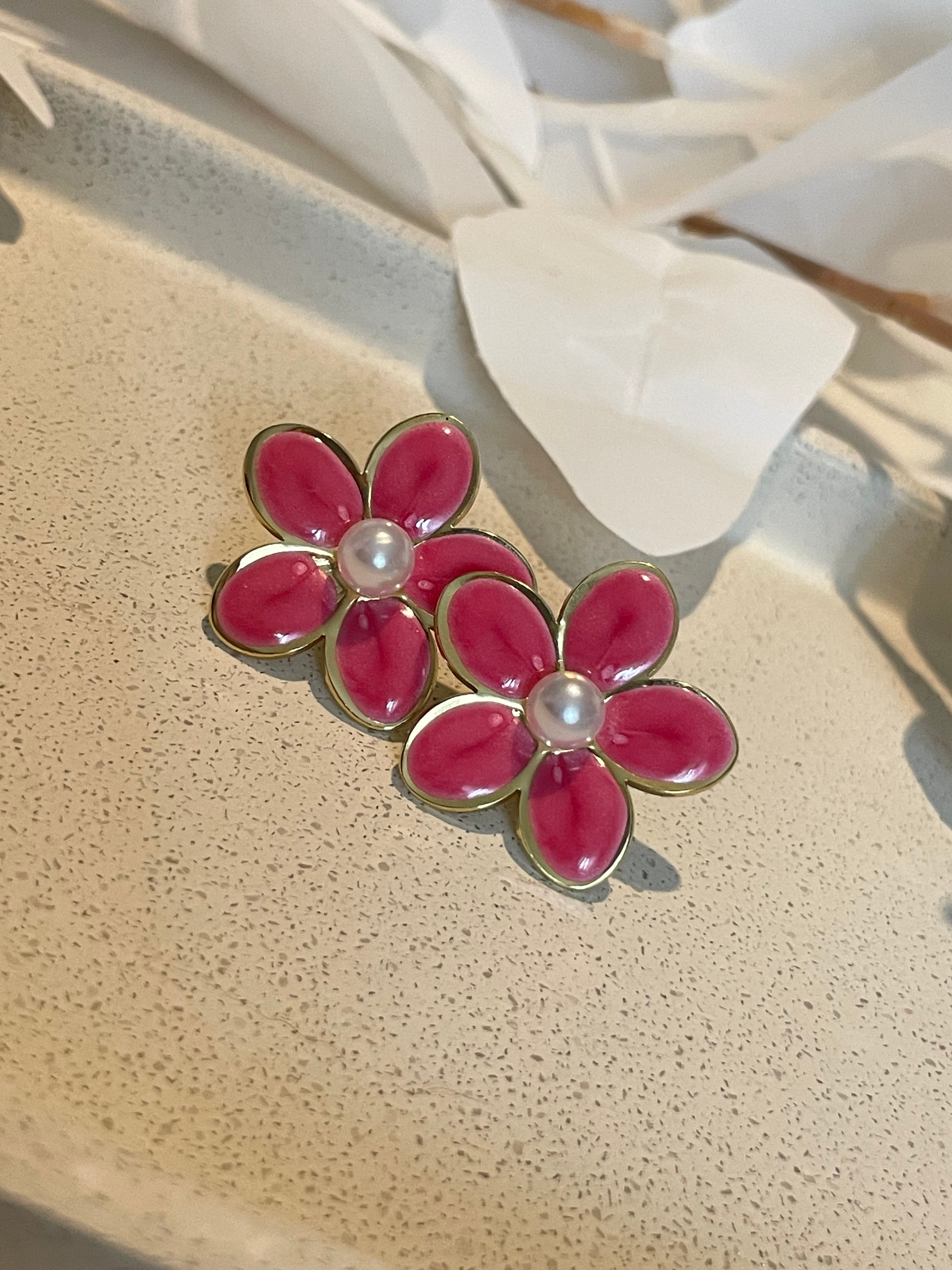 Boucle d’oreille fleur rose